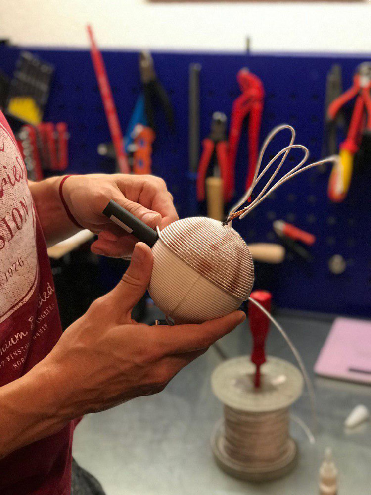 Hands-working-on-HELV-Motor-coil.jpg Hands-working-on-HELV-Motor-coil.jpg